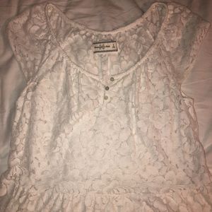 White see through flowery patterned shirt